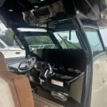 Scout 400 LXF helm with triple Garmin 8616 displays