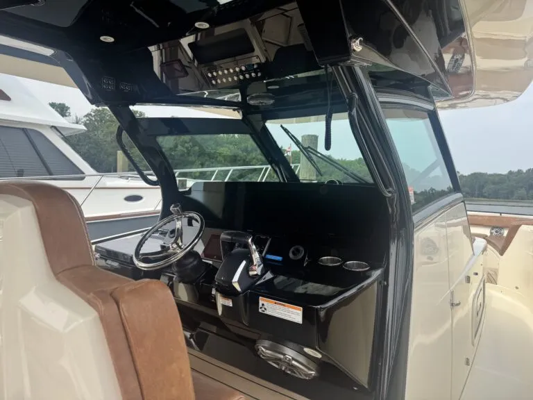 Scout 400 LXF helm with triple Garmin 8616 displays