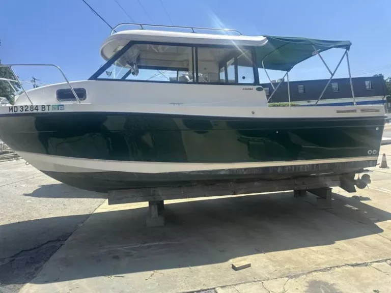Trophy 2359 Walkaround underway with hardtop cabin and Green gelcoat, built for Chesapeake Bay fishing.