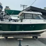Trophy 2359 Walkaround in Jade Mist Green with hardtop cabin, docked at Oak Grove Marina in Edgewater, Maryland.