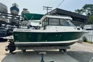 Trophy 2359 Walkaround in Jade Mist Green with hardtop cabin, docked at Oak Grove Marina in Edgewater, Maryland.