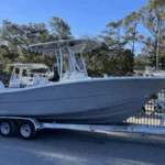 2026 Bulls Bay 230 Center Console with Silver hull, Suzuki 200APXW, hardtop, and Garmin display, for sale at Rhode River Boat Sales in Edgewater, MD.