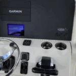 Twin Suzuki controls and Garmin display on Pioneer 270 Pelagic center console