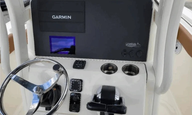 Twin Suzuki controls and Garmin display on Pioneer 270 Pelagic center console